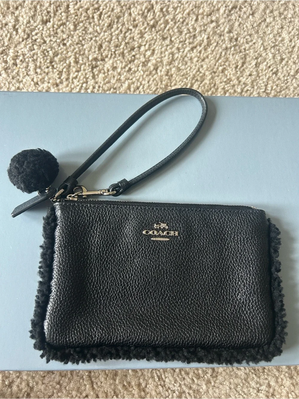 Coach Black Leather Wristlet with Shearling Trim Pom-Pom